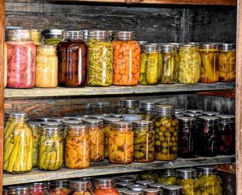 lots of homemade canned vegetables in jars