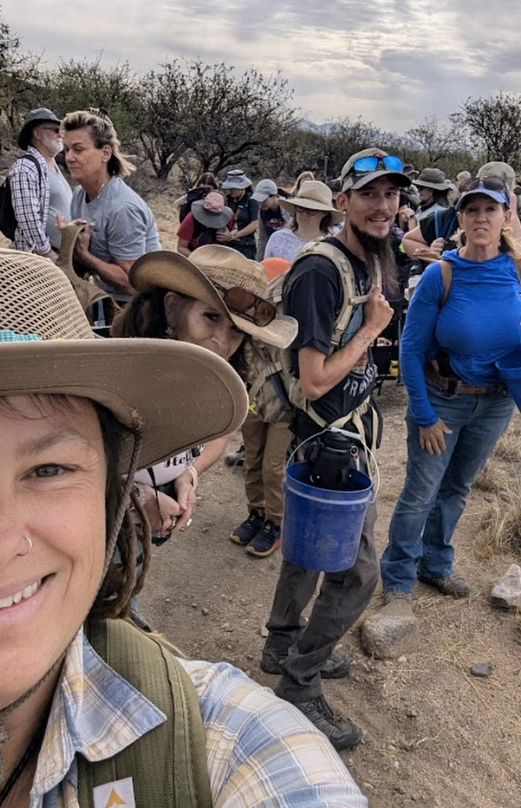 me guiding a huge group to my mining claim for a rockhounding tour